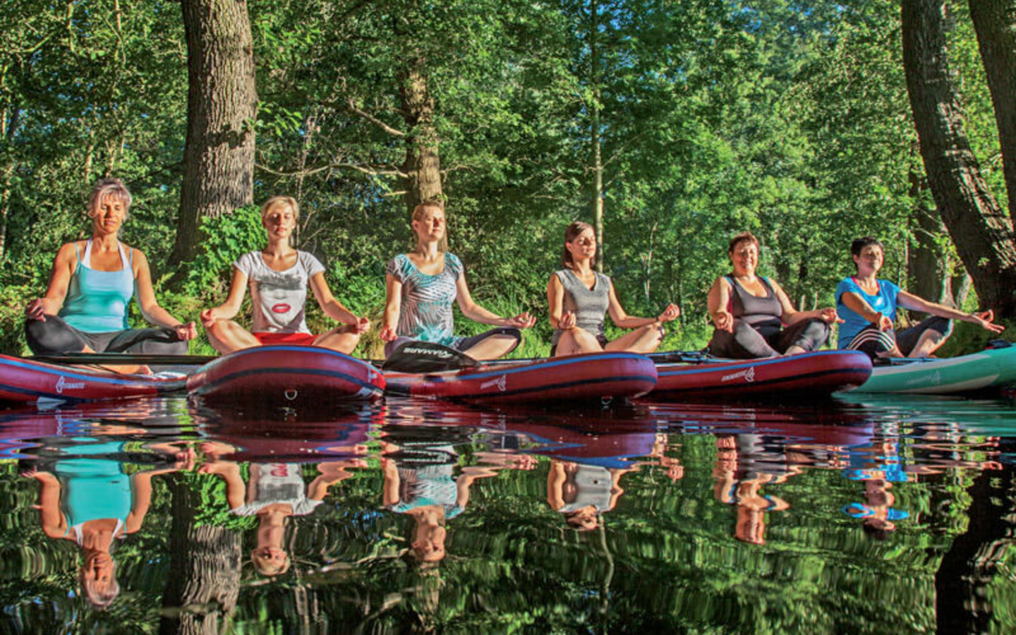 SUP-Yoga, Foto: Gesundheitsstudio Andrea Dabow, Lizenz: Amt Burg (Spreewald)